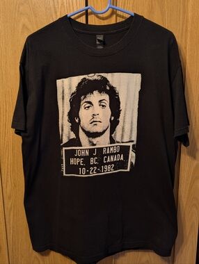 Black Short-Sleeve Graphic Tee with Front Mugshot Print Of Sylvester Stallone
